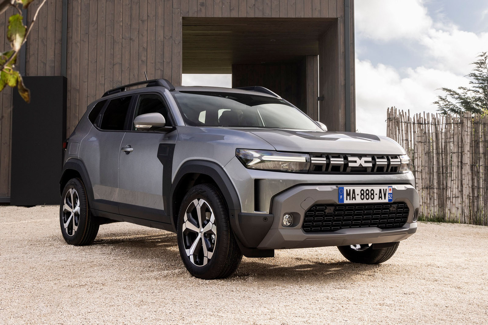 new 2024 dacia duster front quarter static silver